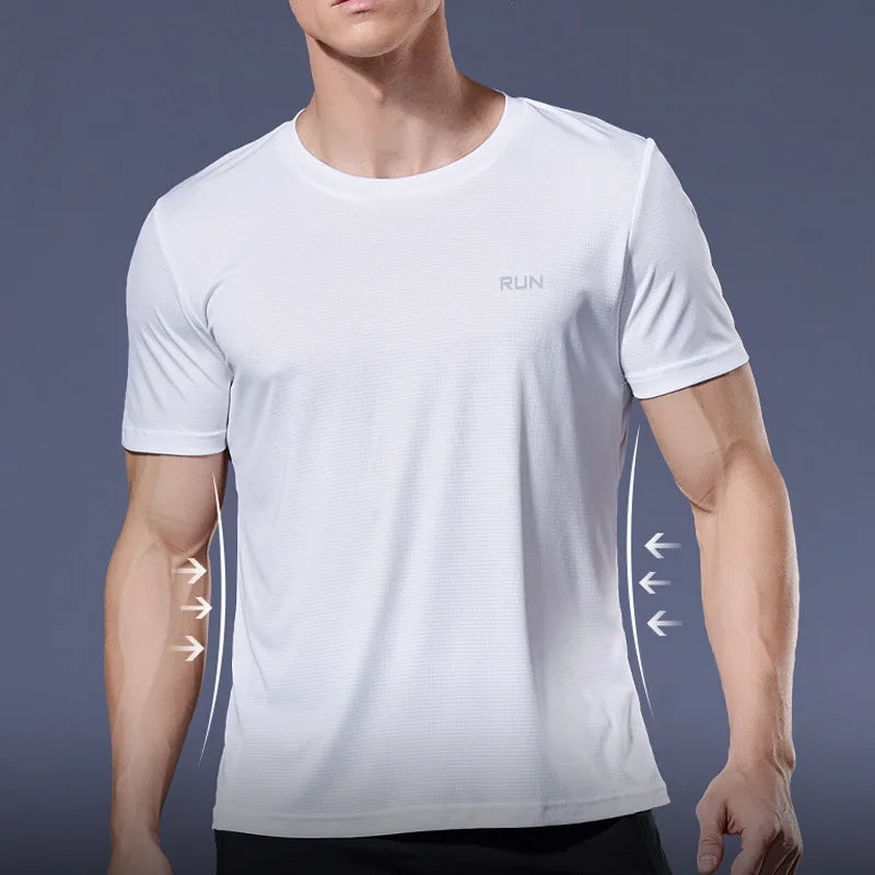 Man wearing a white Mandotos International quick dry compression running t-shirt.