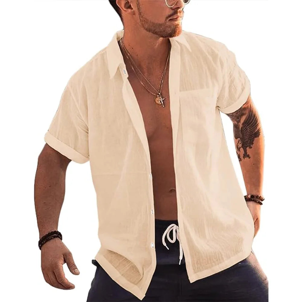 Man wearing a cream linen cotton short sleeve button up beach shirt with pocket.