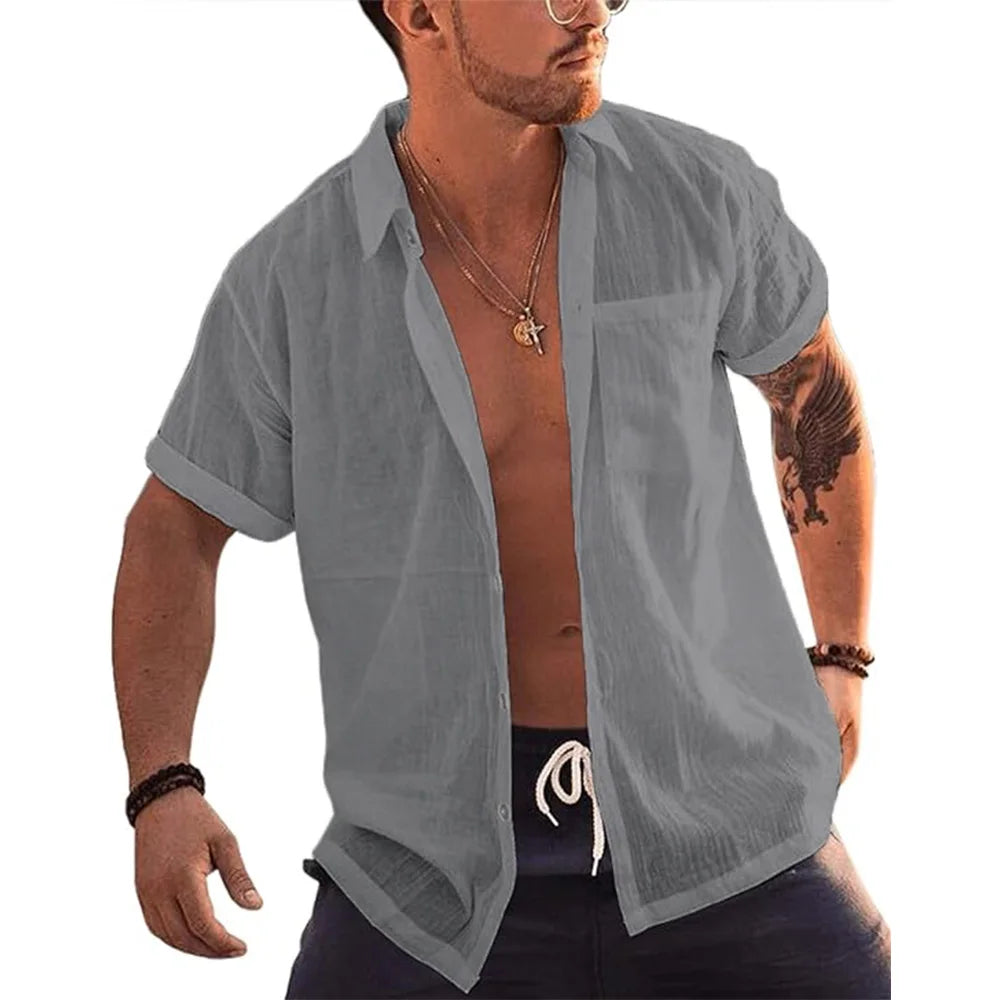 Man wearing a grey short sleeve linen cotton beach button up shirt by Mandotos International