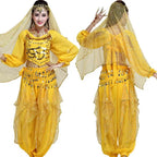 Woman wearing a yellow Mandotos International belly dance costume with sequins and a veil.