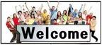 A diverse group of happy people celebrating with arms raised behind a large Welcome sign.