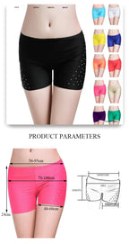 Belly dance safety shorts with diamond embellishments in various colors.