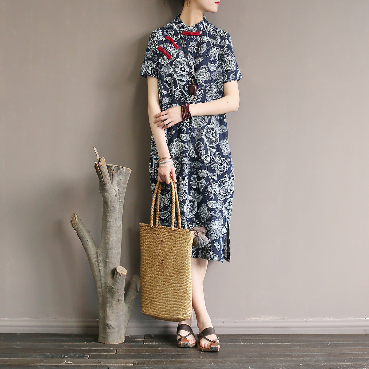 Mandotos International retro floral cotton dress with side slit, featuring a vintage-inspired design and vibrant floral pattern.