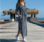 Mandotos International chic V-neck high-waist striped maxi dress in navy and white.
