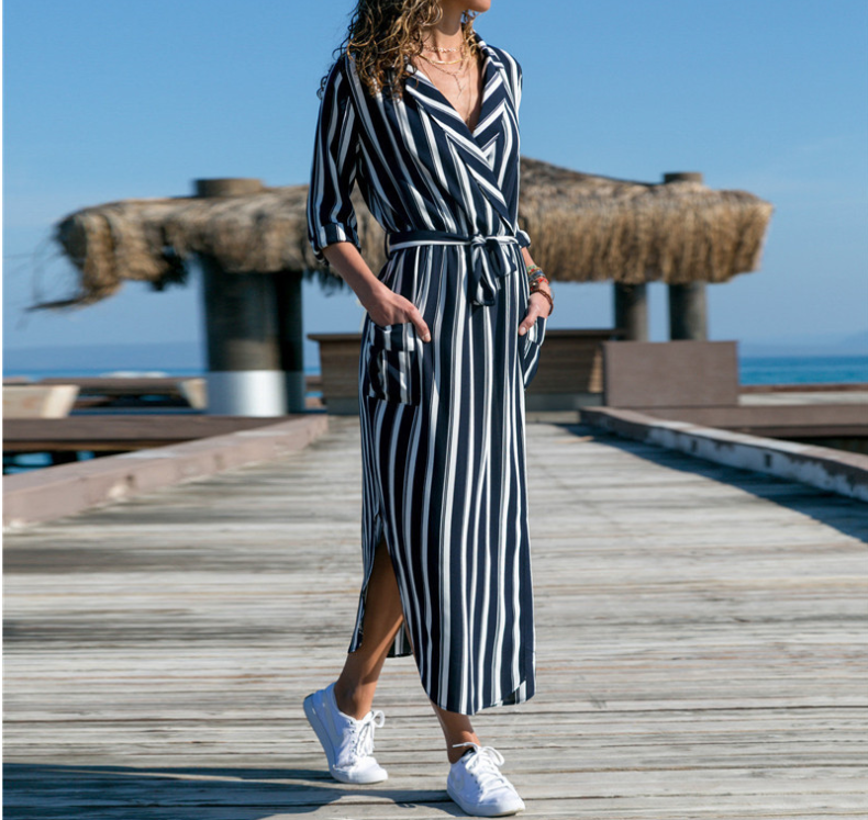 Mandotos International chic V-neck high-waist striped maxi dress in navy and white.