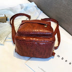 Ancient Energy casual women's small backpack with wild pattern, featuring adjustable straps and compact design for everyday use.