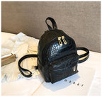 Casual Wild Women's Small Backpack by Ancient Energy, featuring a stylish design with adjustable straps and compact storage.