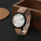 Vintage leather women's quartz wrist watch by Ancient Energy, showcasing a classic design with a round clock face and leather strap.