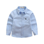 Children's long-sleeved boys' shirts by Ancient Energy, featuring colorful patterns and comfortable fabric.