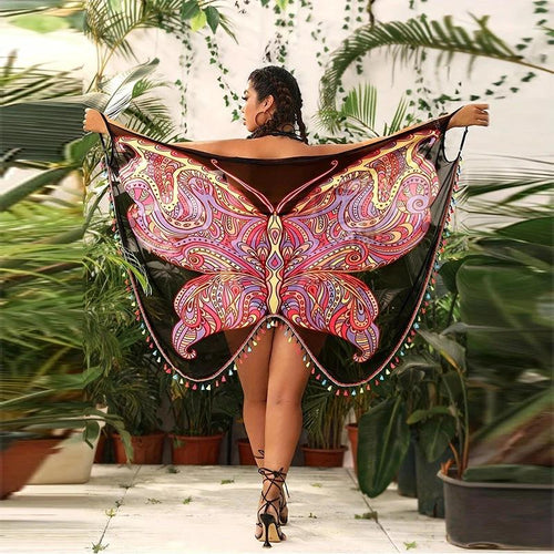 Ancient Energy butterfly cloak blouse featuring seaside-inspired design with flowing fabric and vibrant colors.