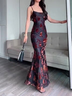 Flocked strappy maxi dress by Ancient Energy featuring a flowing silhouette and intricate strap details.