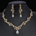 Golden zircon bridal jewelry set with matching necklace and earrings, featuring elegant design for wedding or special occasions.