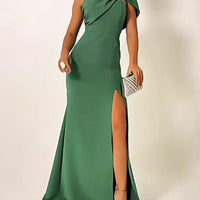 Green bow-tie tube top evening dress by Ancient Energy, featuring a fitted silhouette and stylish design.