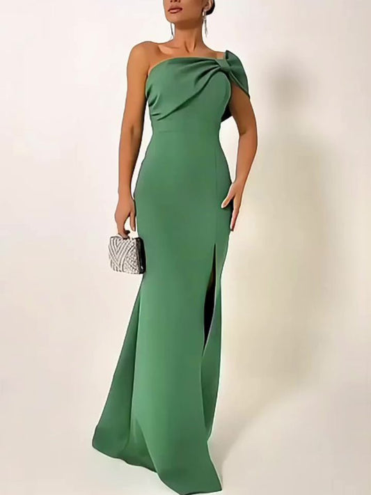 Green bow-tie tube top evening dress by Ancient Energy, featuring a fitted silhouette and stylish design.