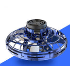 Ancient Energy LED UFO flying helicopter spinner toy for kids, featuring colorful lights and spinning motion.
