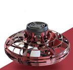 Ancient Energy LED UFO flying helicopter spinner toy for kids with colorful lights and spinning motion.