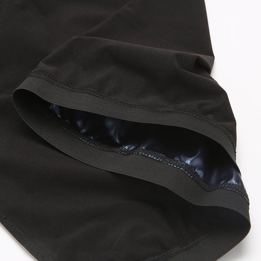 Men's neoprene sauna waist trainer shapewear corset vest by Ancient Energy, designed to contour the waist and promote sweating.