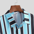 Men's striped shirt by Ancient Energy featuring a classic design and button-down front, shown in a close-up view.