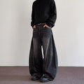 Ancient Energy men's high-street relaxed wide-leg pants in premium-looking fabric, styled casually with a folded waistband.