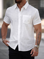 Men's short-sleeve cotton shirt with a chest pocket by Ancient Energy, featuring a classic fit and comfortable design.