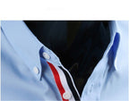 Men's long-sleeved shirt by Ancient Energy, shown in a stylish fit with a classic collar and button-down design.