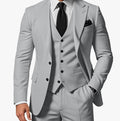 Elegant men's three-piece business suit by Ancient Energy, featuring a jacket, vest, and trousers in classic dark fabric.