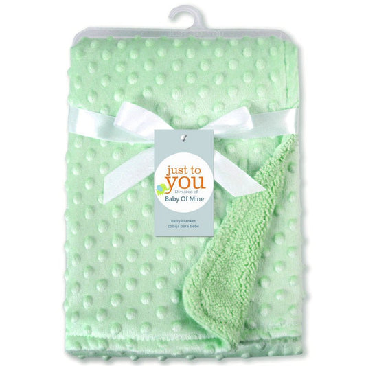 Ancient Energy Polar Dot baby blanket, soft swaddle wrap for newborns, cozy envelope-style bedding for infants.