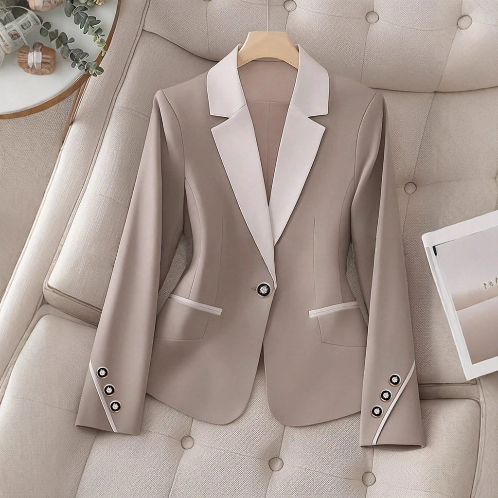 Elegant formal blazer with contrasting color buttons by Ancient Energy, showcasing tailored fit and sophisticated style.