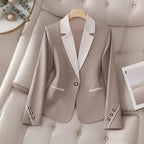 Elegant formal blazer with contrasting color buttons by Ancient Energy, showcasing tailored fit and sophisticated style.