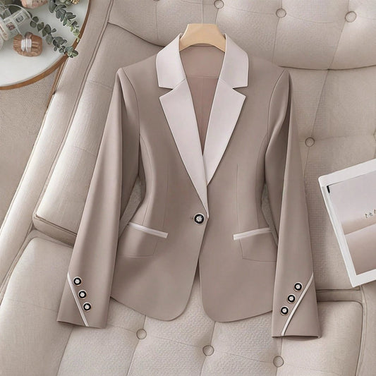 Elegant formal blazer with contrasting color buttons by Ancient Energy, showcasing tailored fit and sophisticated style.