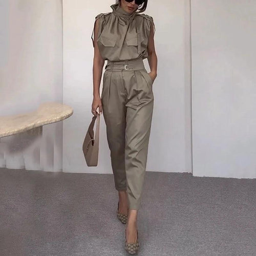 Ancient Energy shoulder slimming waist belt with decorative blouse and pants, showcasing a stylish and slimming fashion ensemble.