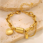 Ancient Energy titanium bracelet featuring a heart-shaped pendant, sleek and versatile jewelry design.