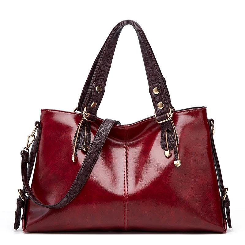 Women's large capacity soft leather shoulder messenger handbag by Ancient Energy, featuring multiple compartments and stylish design.