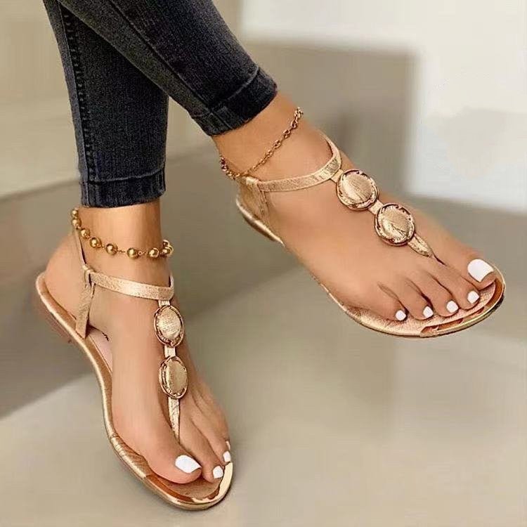Women's summer casual flat thong beach sandals by Ancient Energy, featuring a comfortable design and neutral color.