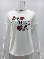 Women’s summer casual blouse shirt by Ancient Energy, loose fit T-shirt top with short sleeves and relaxed style.