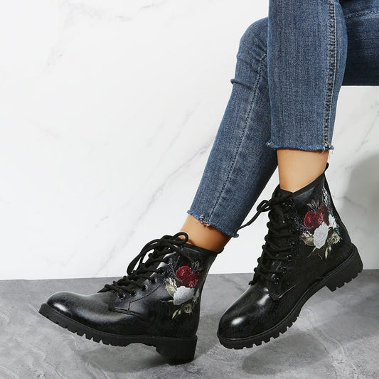 Ancient Energy women's high top workwear boots with large Halloween cartoon print, featuring colorful Halloween-themed patterns and details.