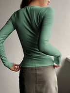 Mandotos International chic sage green ribbed long sleeve half-button women's tee.