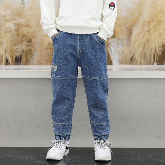Boys' spring and autumn jeans from Ancient Energy featuring classic denim style and adjustable waist for a comfortable fit.