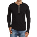 Man wearing a black plus size solid raglan long sleeve Henley tee by Mandotos International