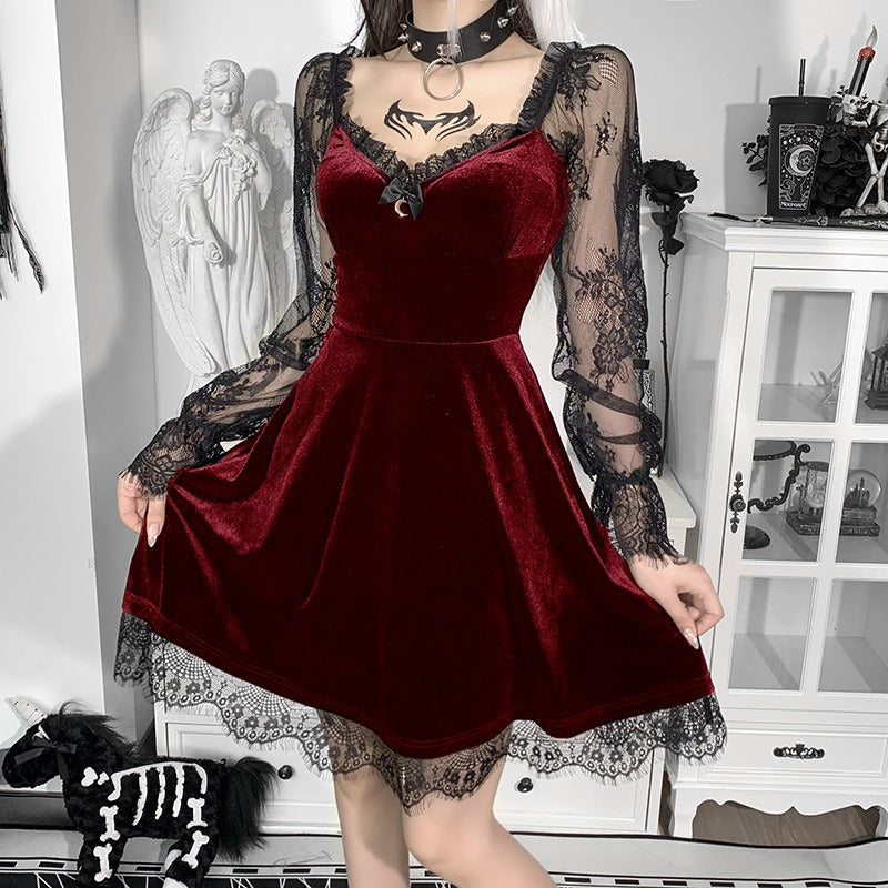Mandotos International chic burgundy velvet dress with black lace sleeves and trim