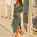 Mandotos International chic V-neck high-waist printed dress in teal and orange zebra pattern.