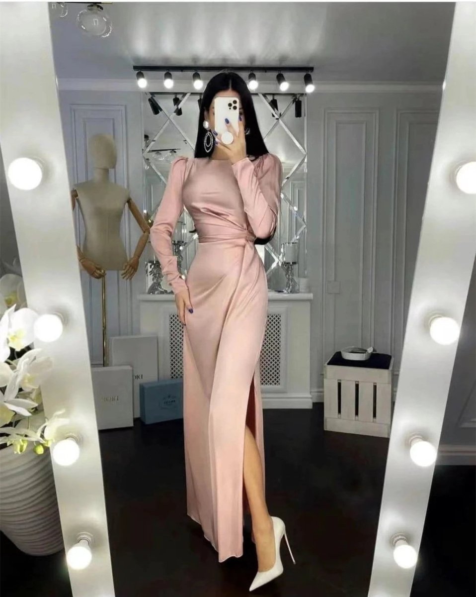 Mandotos waist-fitting irregular dress featuring a stylish, flowy design with a unique silhouette and elegant details.