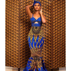 Mandotos digital print fishtail dress featuring vibrant patterns and a fitted silhouette, perfect for stylish occasions.