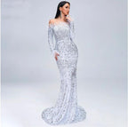 Elegant black evening dress by MANDOTOS featuring a fitted silhouette and stylish design for formal occasions.