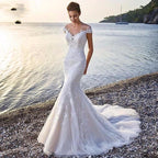 Mandotos Princess Bride Mermaid wedding dress in white with lace details, trailing backless design, elegant bridal gown.