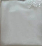 White Princess Bride mermaid wedding dress by MANDOTOS featuring backless lace design with trailing train.