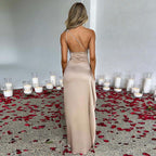 Elegant black one-shoulder backless satin dress with slit, slim-fit design, perfect for summer occasions, by MANDOTOS.