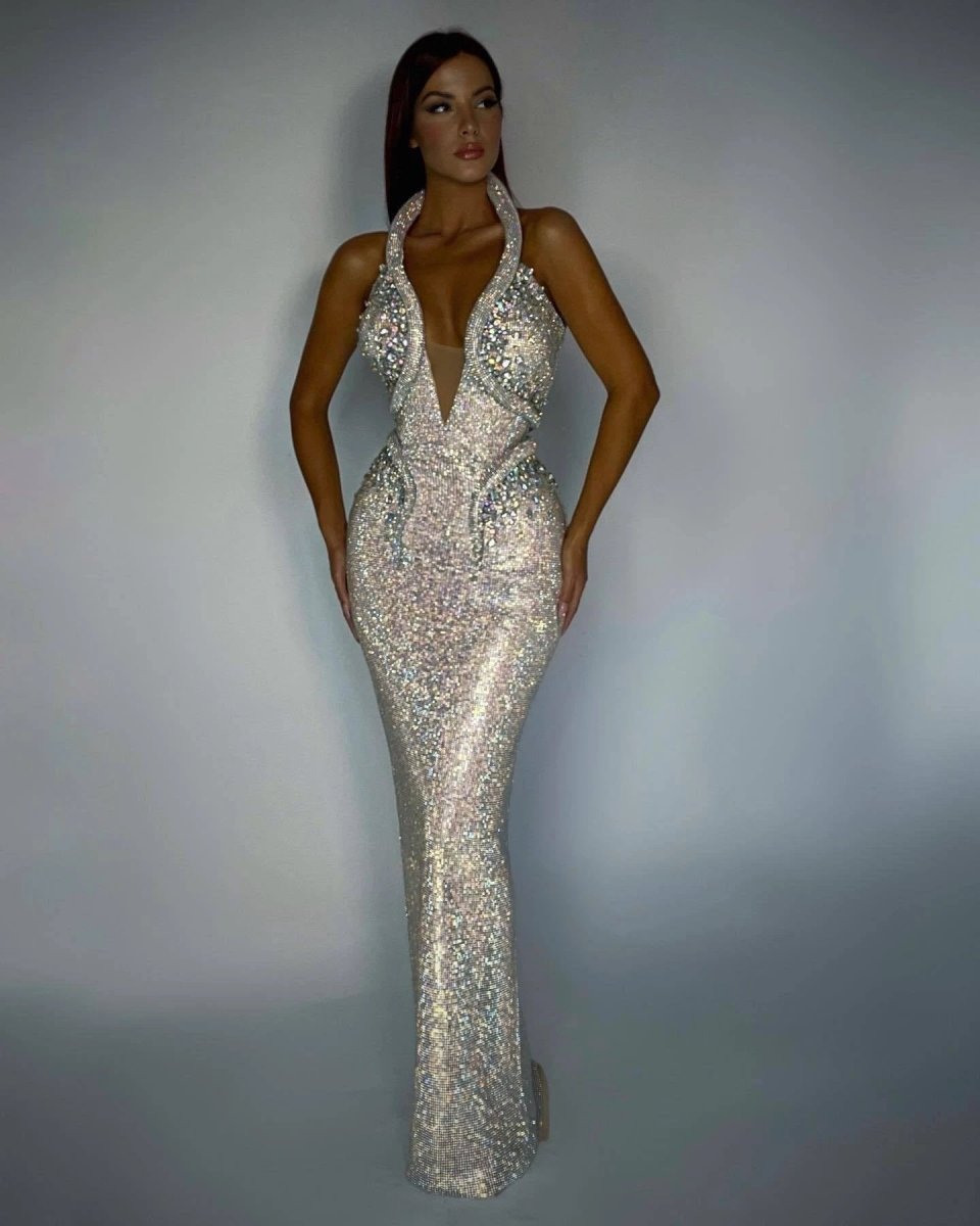 Mandotos sexy sequined banquet dress with sheath silhouette and trailing hem, perfect for elegant evening events.