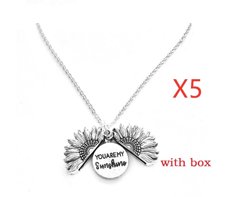 Mandotos sunflower double lettering necklace featuring a sunflower charm and personalized engraved initials on a silver chain.