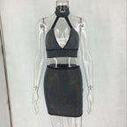 Women’s two-piece dress set with diamond embellishments by MANDOTOS, featuring a stylish top and matching skirt.